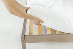 Woman Is Putting Bedding Cover Mattress Pad Bed Putting Off Cleaning Process