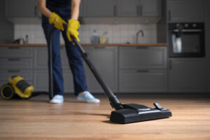 front view woman cleaning home