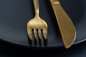 golden cutlery plate dark